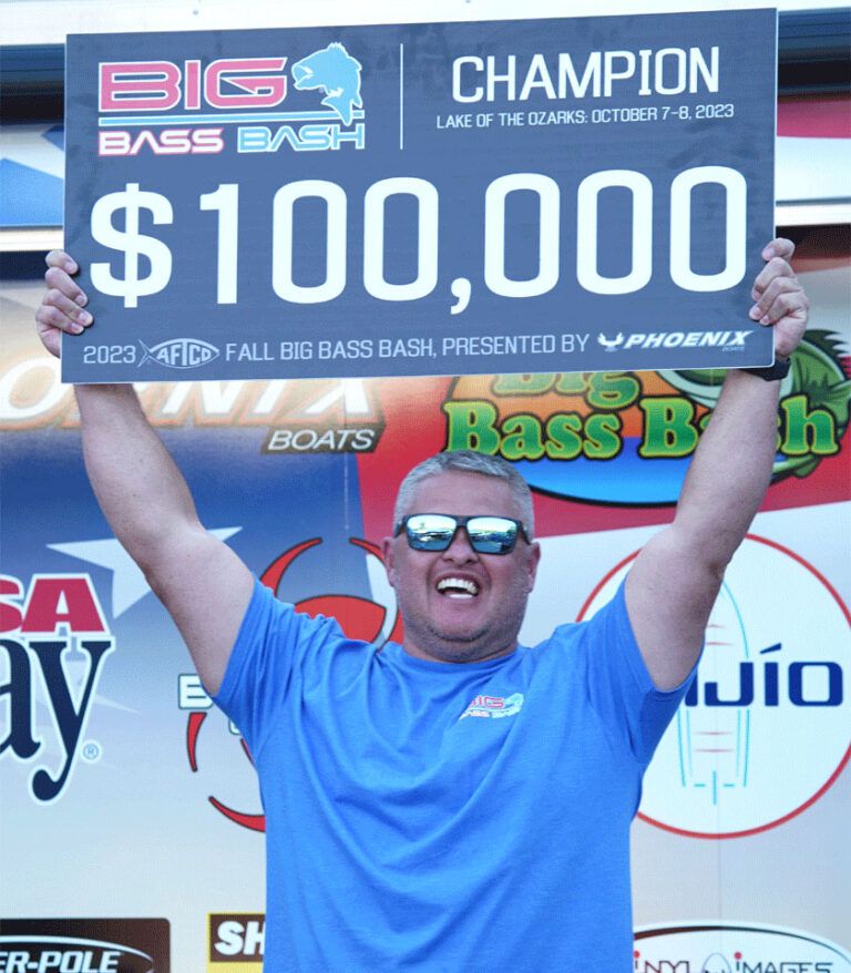 CHRIS (HOOCH) DUNN LANDS THE 100,000 BASS AT THE LAKE OF THE OZARKS